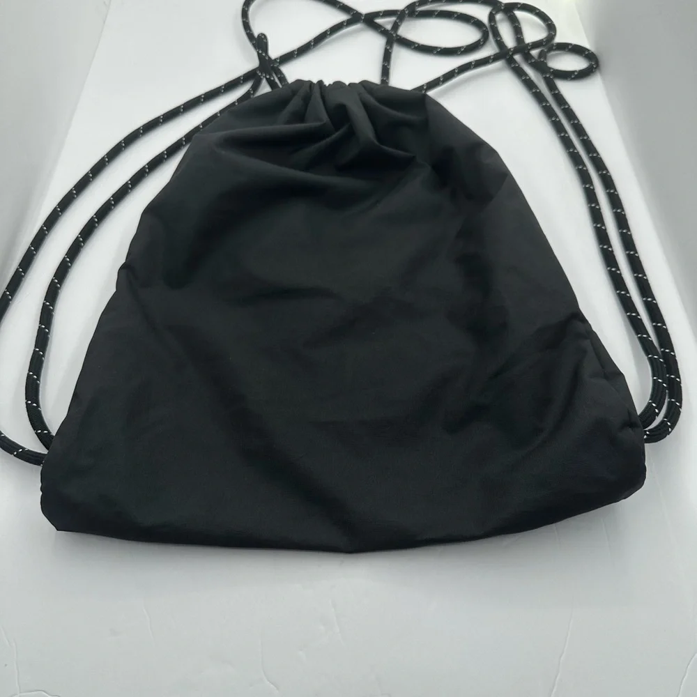 Nike Black Drawstring Sports Sack with White Logo and Red Accent